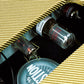 Close-up of tubes and Celestion speaker inside IVU Oxblood GTA-5 5W amplifier