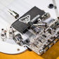 Compact IVU solderless DC plugs displayed with pedalboard hardware